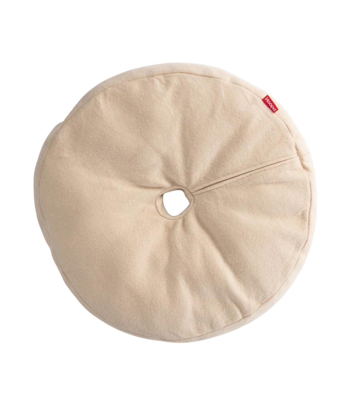 Cuscino per gatto in tessuto morbido colore beige a forma di ciambella. Sfondo bianco