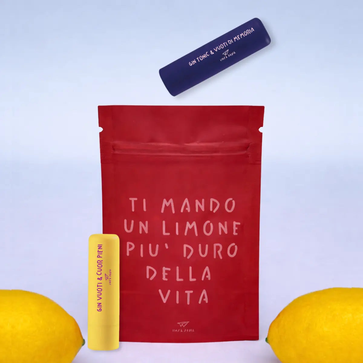 Box San Valentino con stampa "Ti mando un limone più duro della vita" contenente due burrocacao con scritte