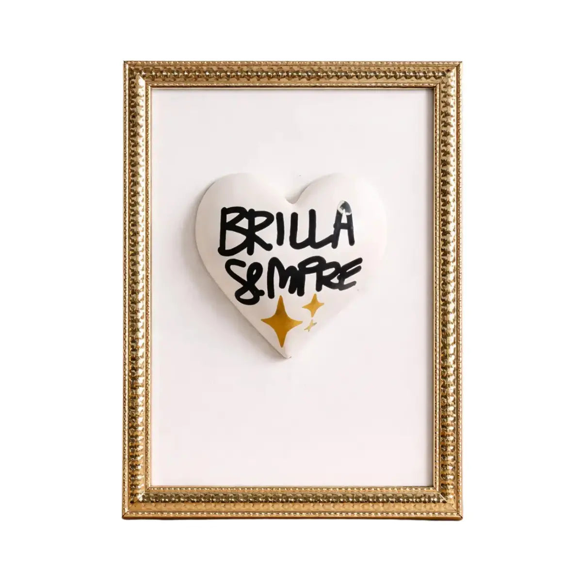 Quadretto CuoreAmore fatto a mano in Italia. Ha una cornice oro e un cuore in ceramica bianco con una scritta  