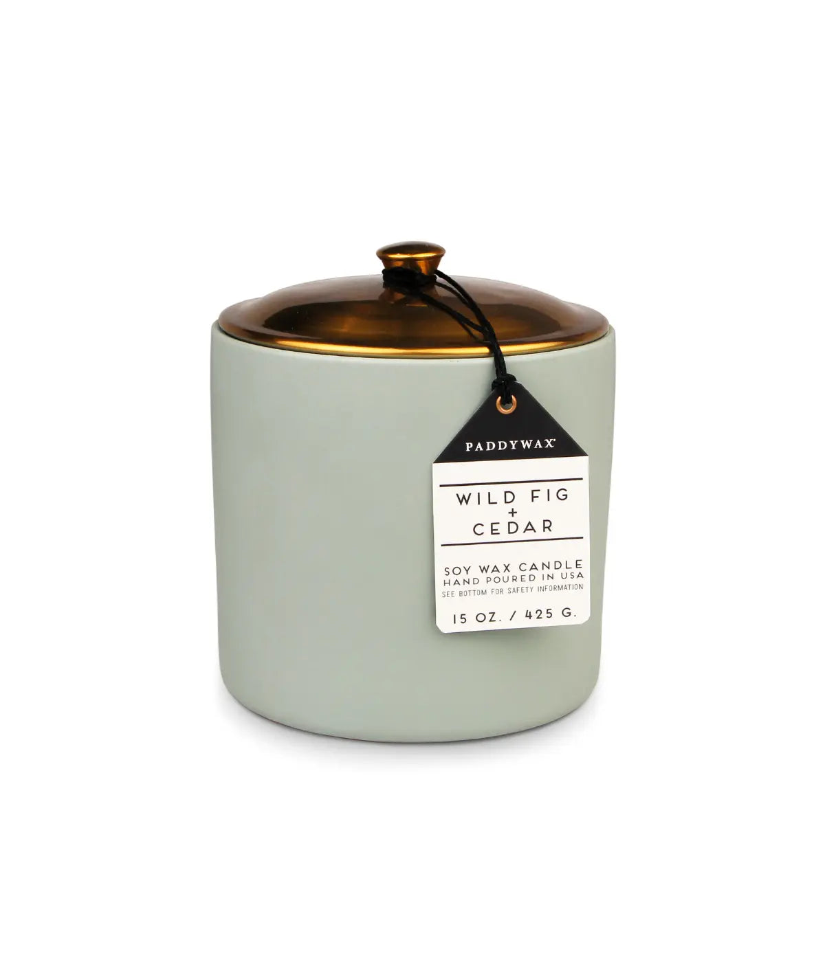 Portacandele verde, tappo in metallo color oro. Etichetta con scritta wild fig chedar. Sfondo bianco