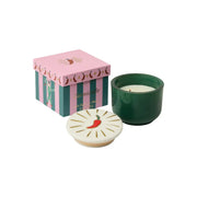 Candela profumata in vasetto verde con coperchio decorato e scatola coordinata.