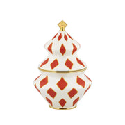 Contenitore per dolci Delight di Alessi ispirato alla forma dell'abete con colori oro, rosso e bianco