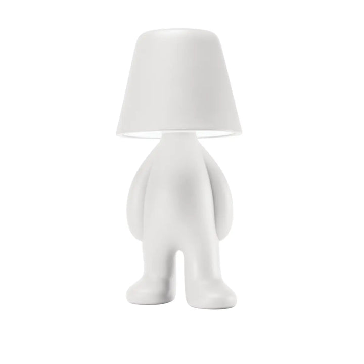Lampada bianca a forma di personaggio in piedi con testa a forma di paralume Qeeboo vista frontale