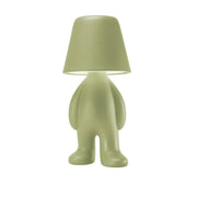 Lampada a forma di personaggio in piedi con testa a forma di paralume verde Qeeboo visione frontale