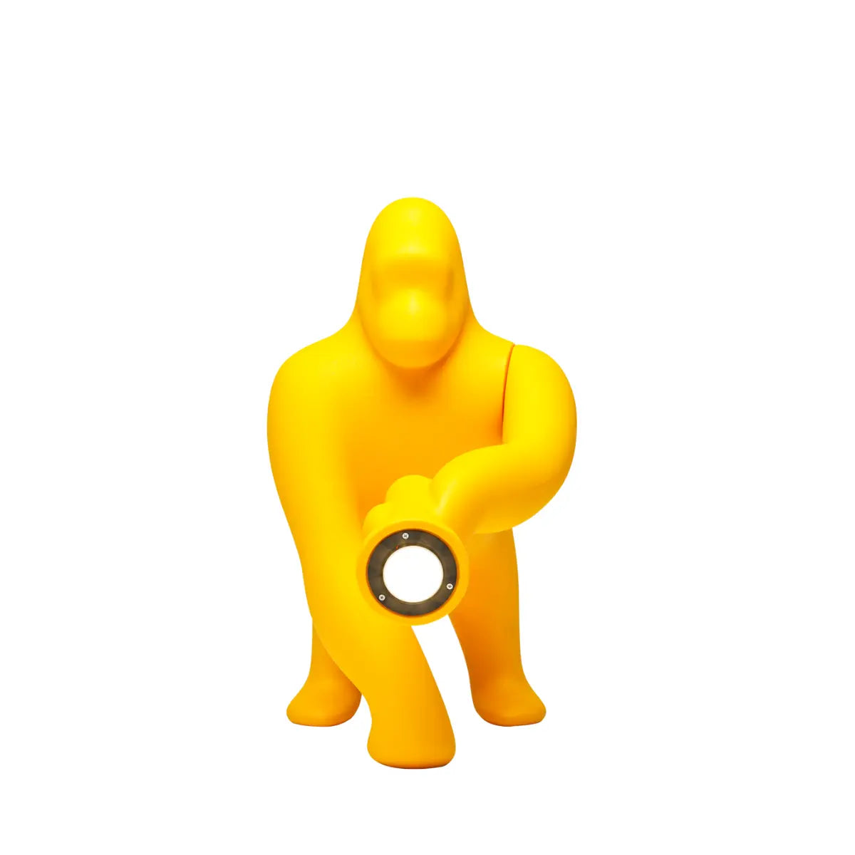 Lampada gialla a forma di King Kong con un braccio esteso che sorregge una torcia frontale