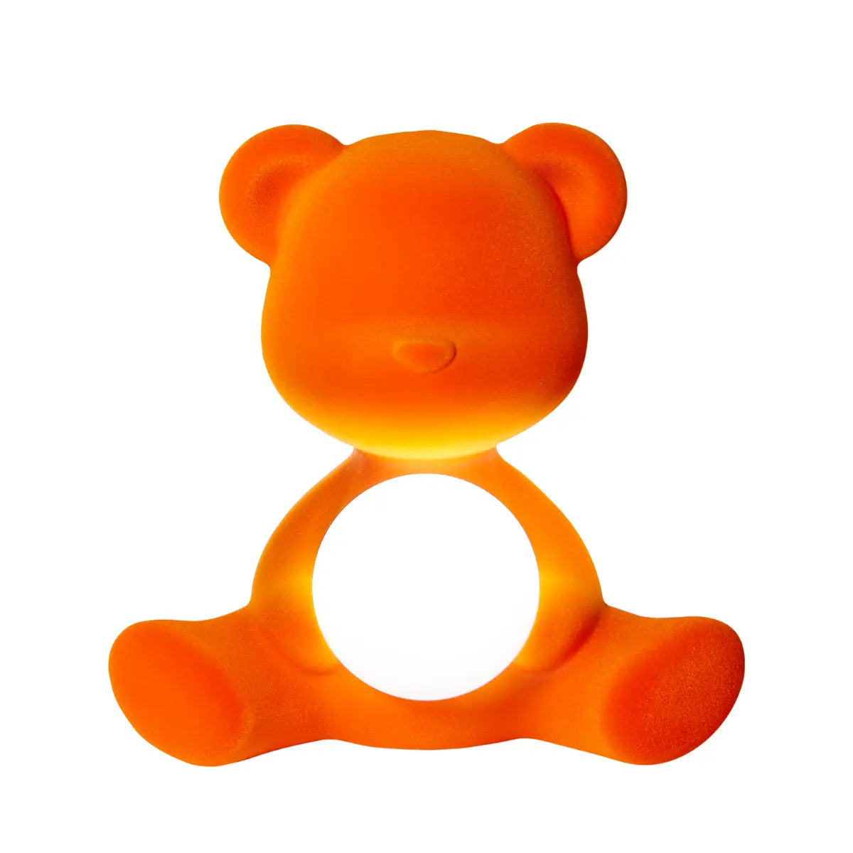 Lampada a forma di orsetto arancione con sfera che s'illumina al centro di Qeeboo