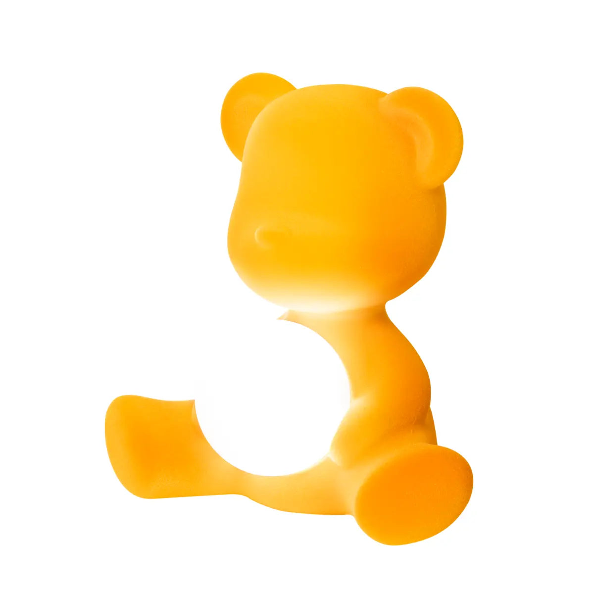 Lampada a forma di orsetto giallo con sfera che s'illumina al centro di Qeeboo profilo