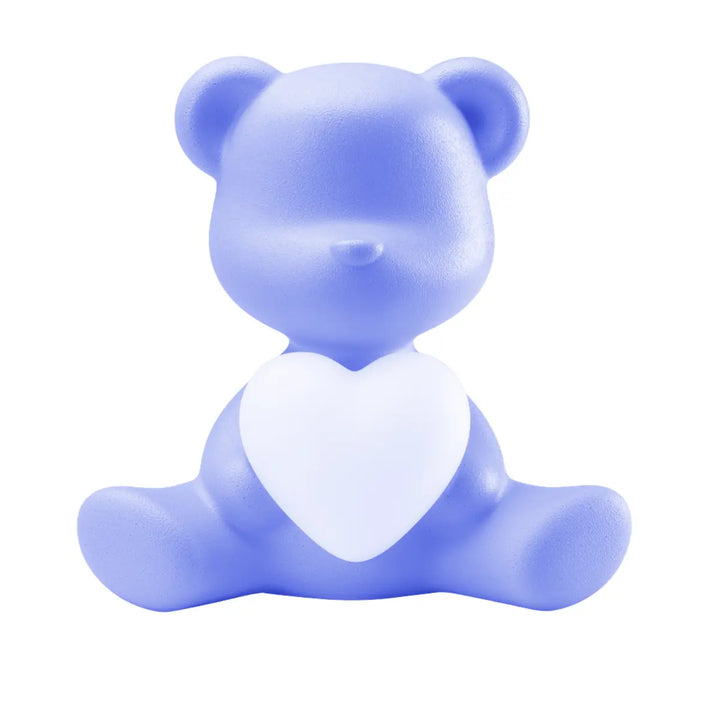 Lampada a forma di orsetto azzurro con cuore che s'illumina al centro di Qeeboo