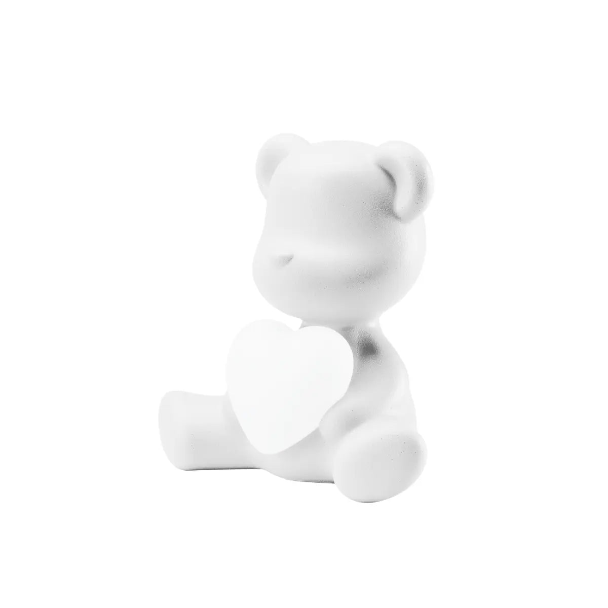 Lampada a forma di orsetto bianco con un cuore luminoso tra le zampe