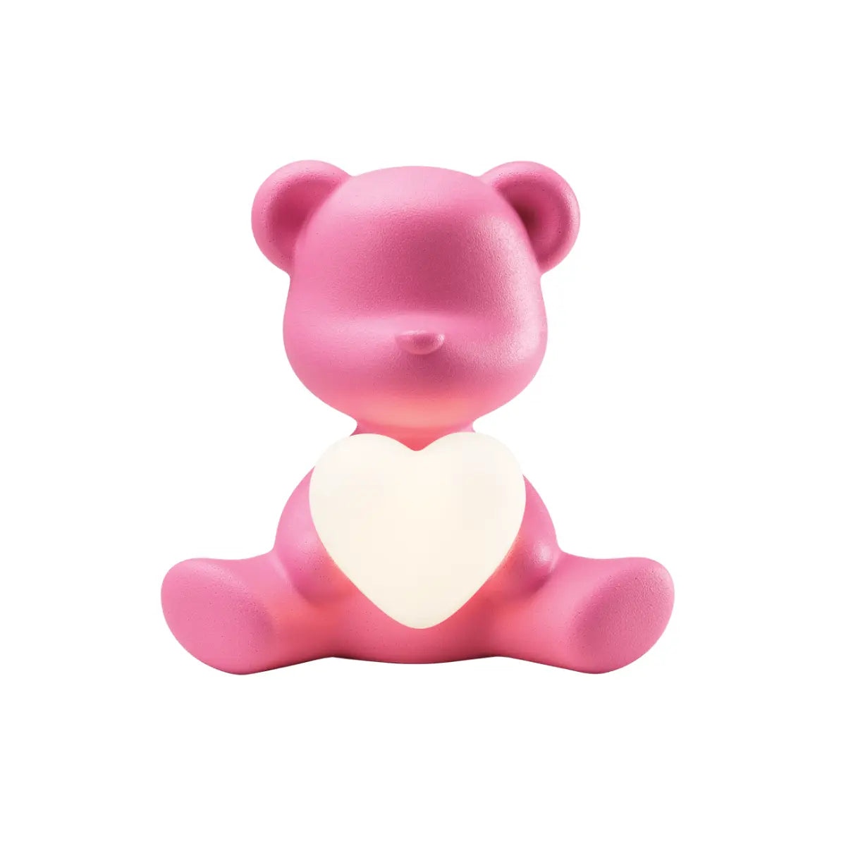 Lampada a forma di orsetto rosa che sorregge un cuore luminoso tra le zampe