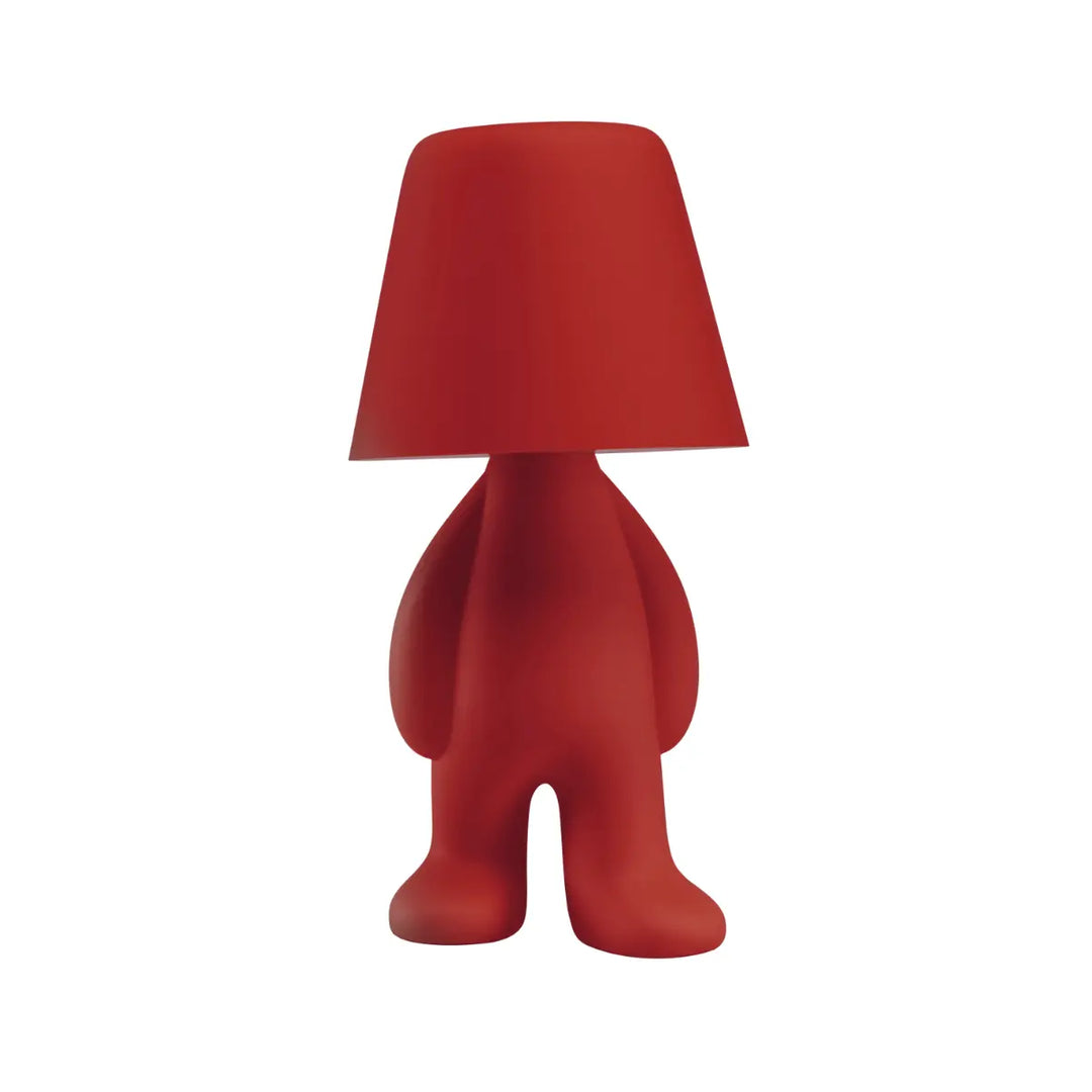 Lampada rossa a forma di personaggio stilizzato, con la testa a paralume