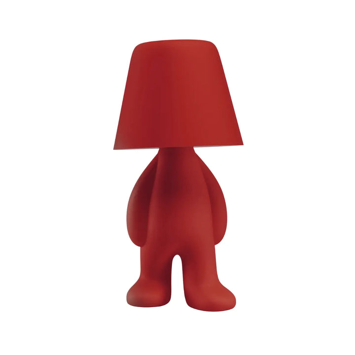 Lampada rossa a forma di personaggio stilizzato, con la testa a paralume
