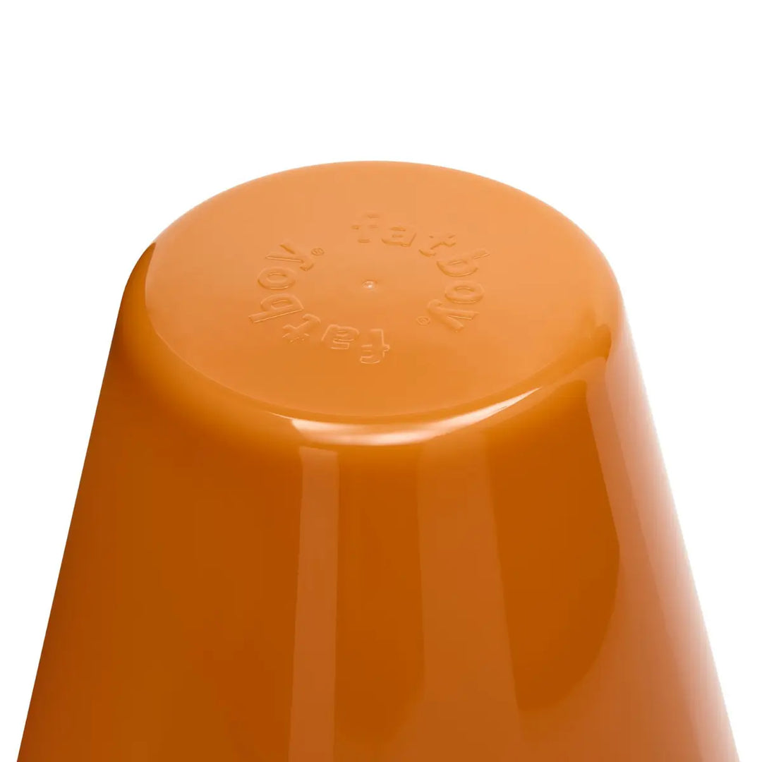Dettaglio parte alta lampada da tavolo Ambiance di Fatboy lucida color arancione pastello da interno  