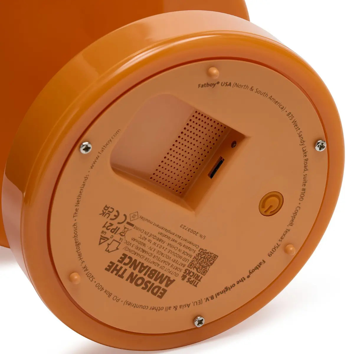 Dettaglio base lampada da tavolo Ambiance di Fatboy lucida color arancione pastello da interno  