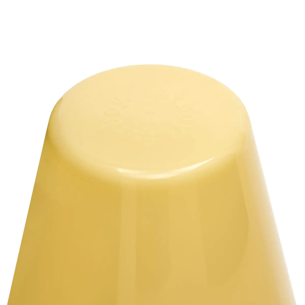 Dettaglio parte alta lampada da tavolo Ambiance di Fatboy lucida color giallo pastello da interno 