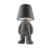 Lampada nera con puntini bianchi a forma di personaggio in piedi con la testa a paralume.