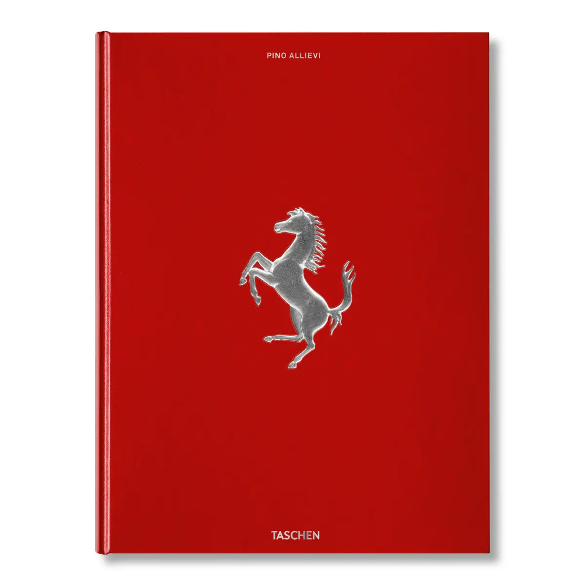 Copertina rossa del libro Ferrari. Cavallo argentato in rilievo e scritte in argento. Sfondo bianco