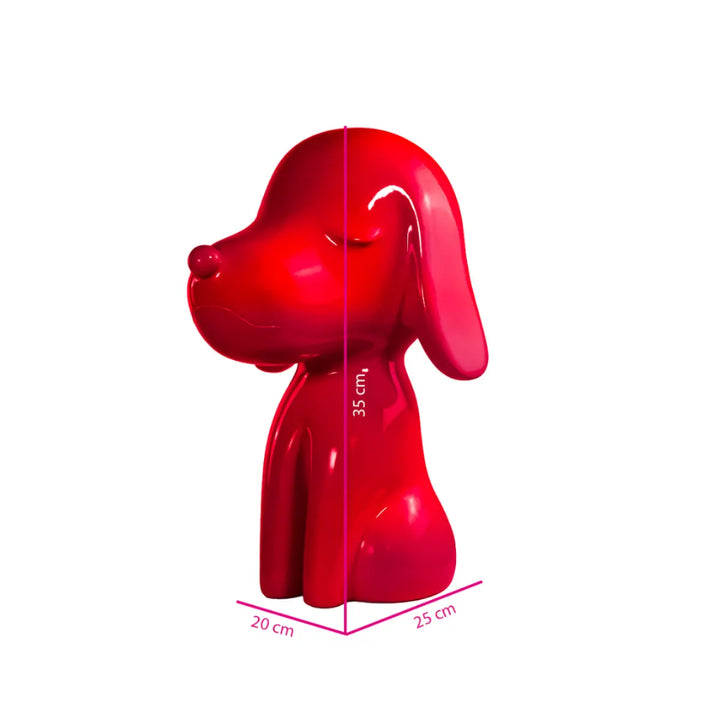 Statua fuxia a forma di cane, con occhi naso e bocca. Altezza profondità e larghezza. Sfondo bianco