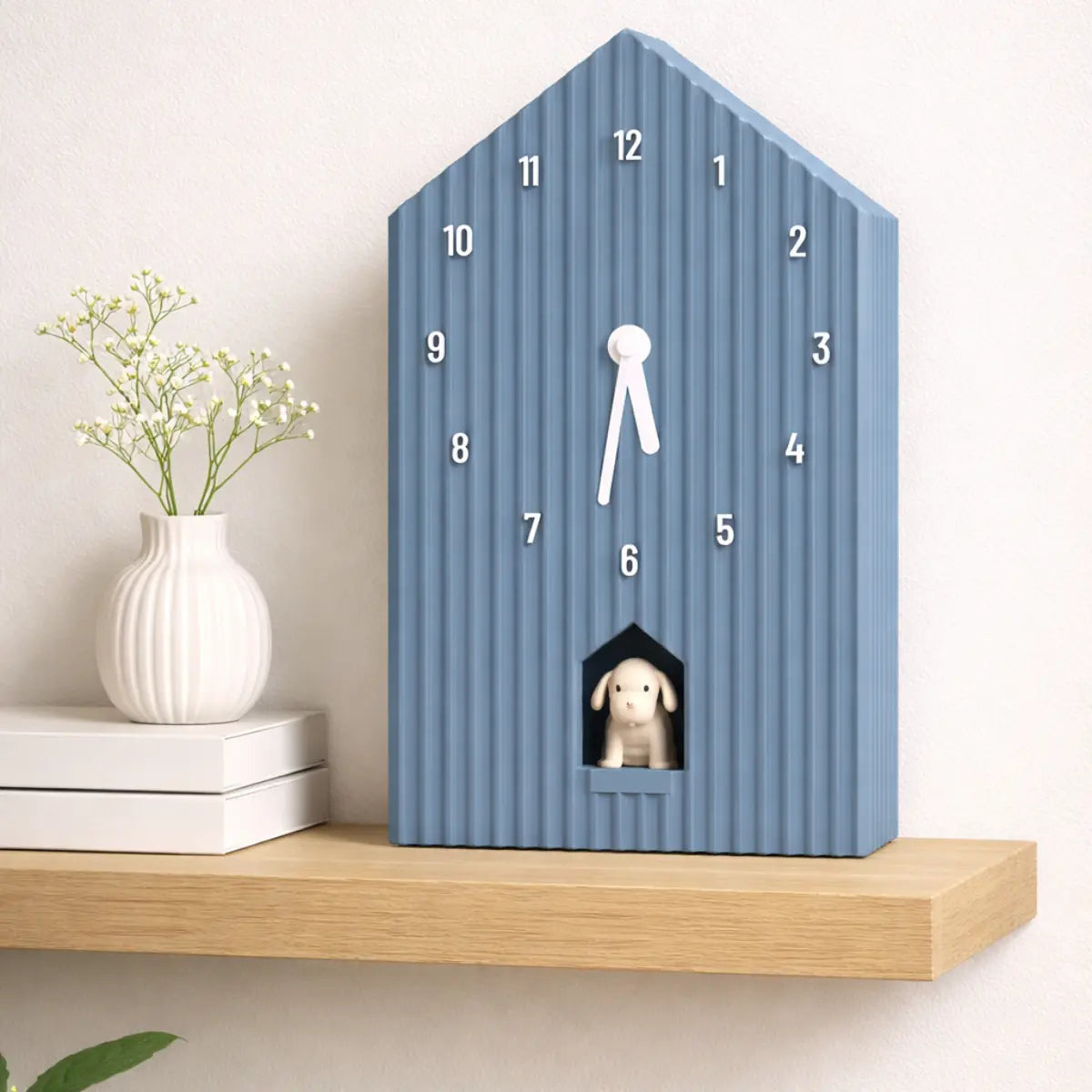 Orologio a cucù a forma di cane celeste