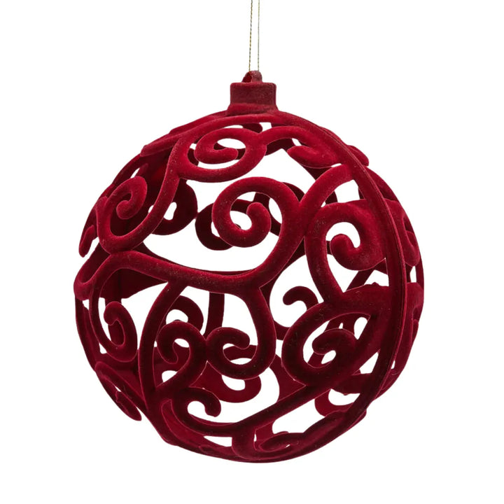 Pallina di Natale in velluto di colore bordeaux con una fantasia arabesche 
