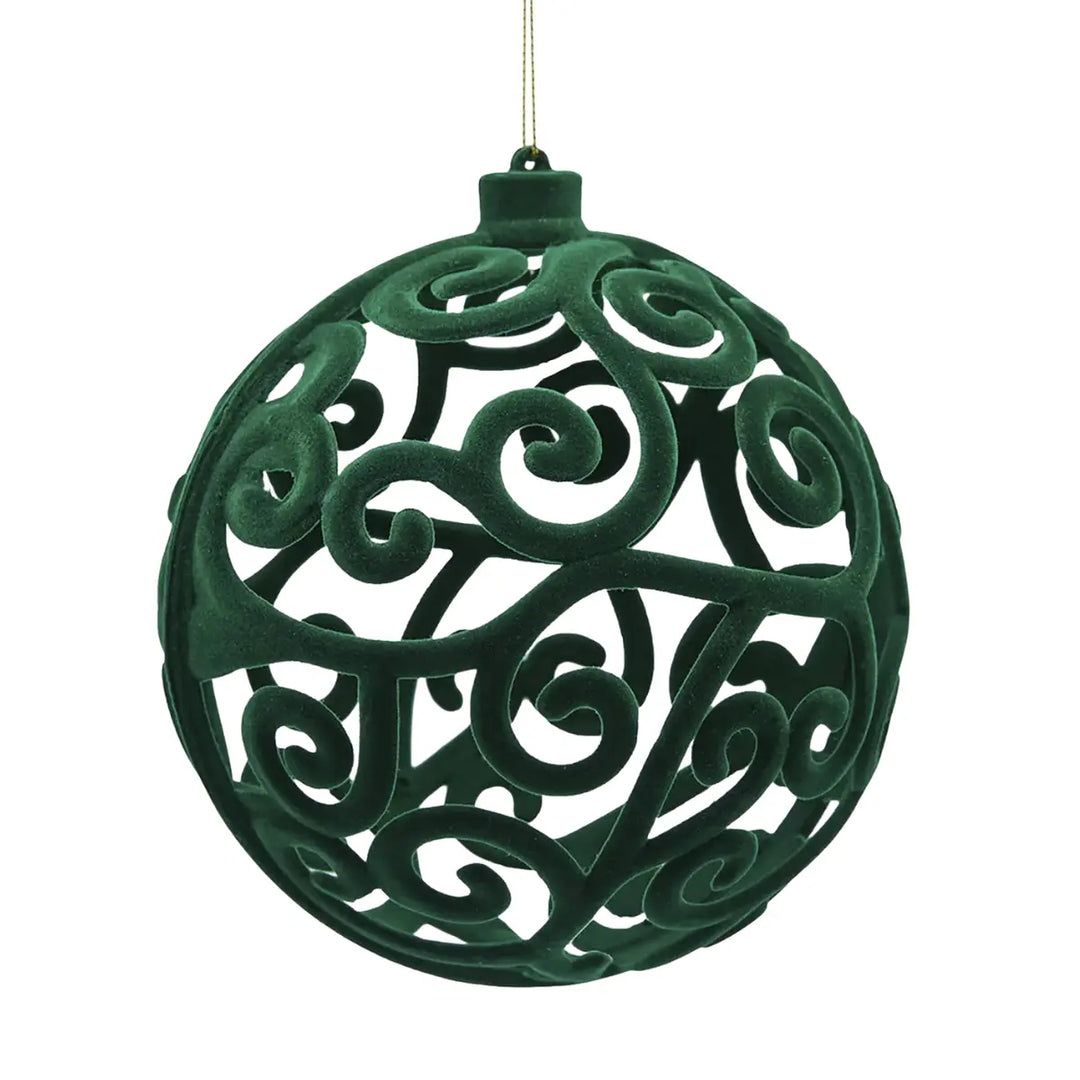 Pallina di Natale in velluto di colore verde con una fantasia arabesche 