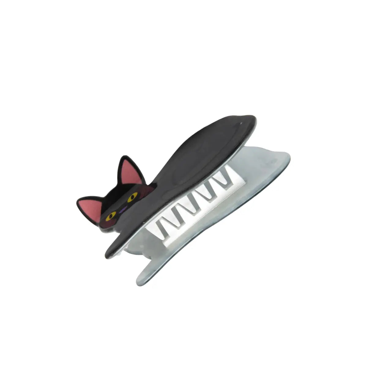 Denti della pinza a forma di gatto nero. La parte interna e i denti della pinza sono in plastica bianca. Lo sfondo dell'immagine è bianco