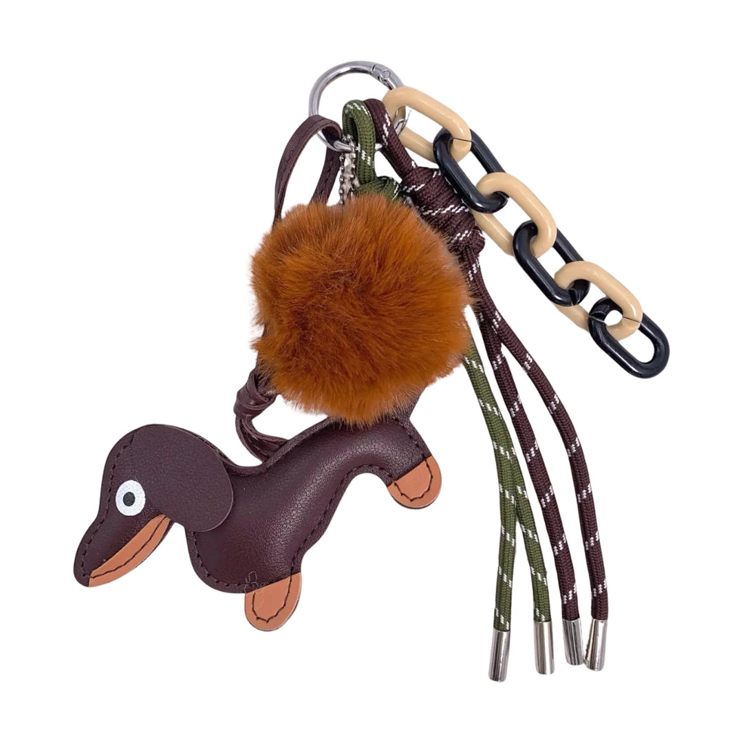 Portachiavi con Ciondolo Bassotto e Pompon su sfondo bianco