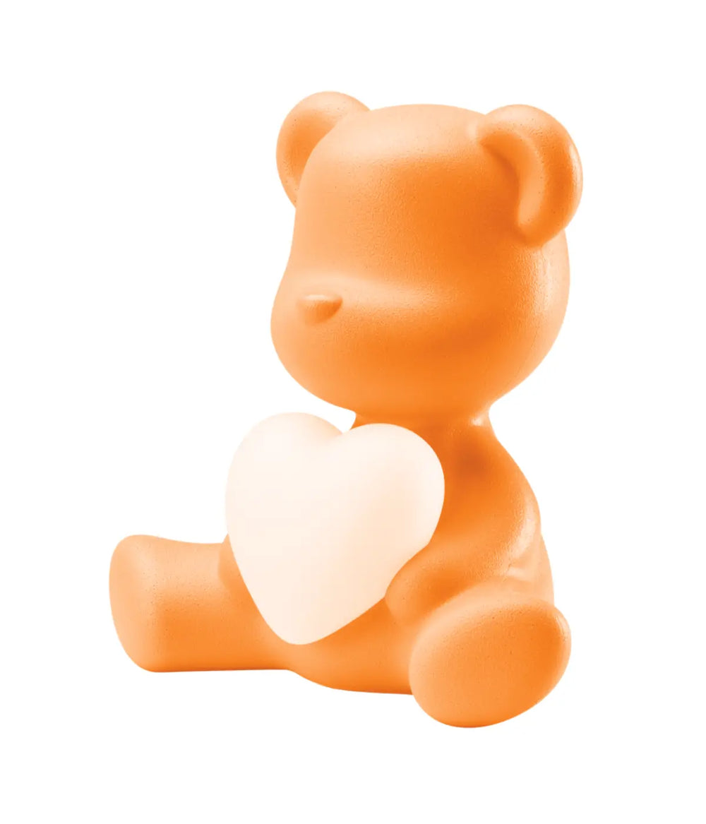Profilo lampada a forma di orsetto  arancione con cuore che s'illumina al centro di Qeeboo