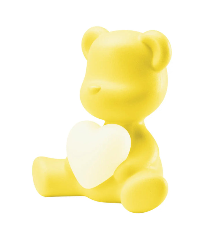 Profilo lampada a forma di orsetto giallo con cuore che s'illumina al centro di Qeeboo