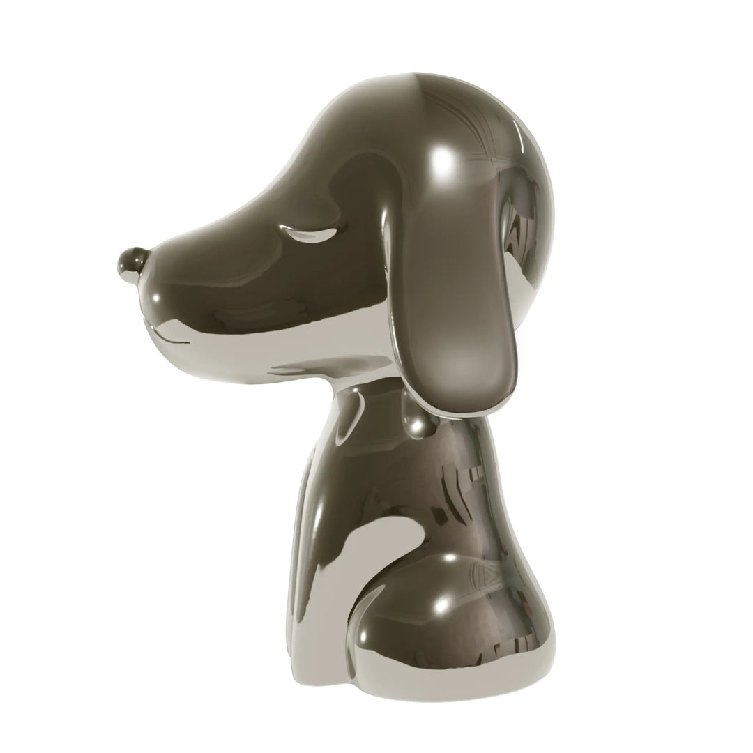 Profilo statua canna da fucile a forma di cane, con occhi naso e bocca. Sfondo bianco