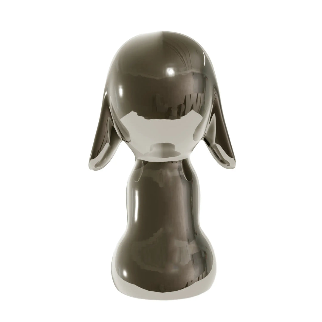 Retro statua canna di fucile a forma di cane, con occhi naso e bocca. Sfondo bianco