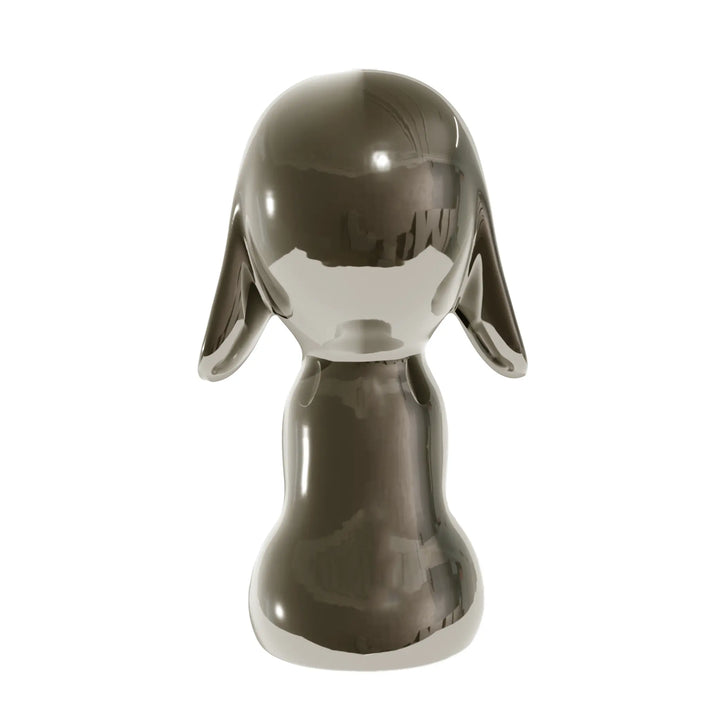Retro statua canna di fucile a forma di cane, con occhi naso e bocca. Sfondo bianco