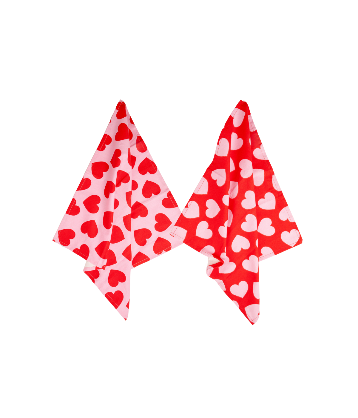 Due strofinacci uno rosa con cuori rossi e uno rosso con cuori rosa. Immagine su sfondo bianco