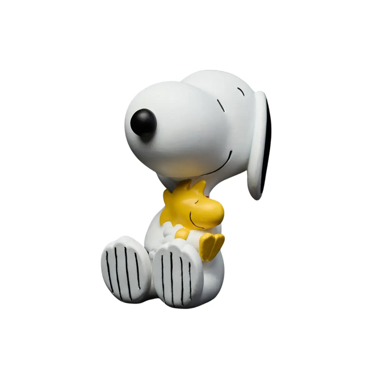 Snoopy Woodstock piccolo, colore bianco che tiene in braccio Woodstock. Sfondo bianco
