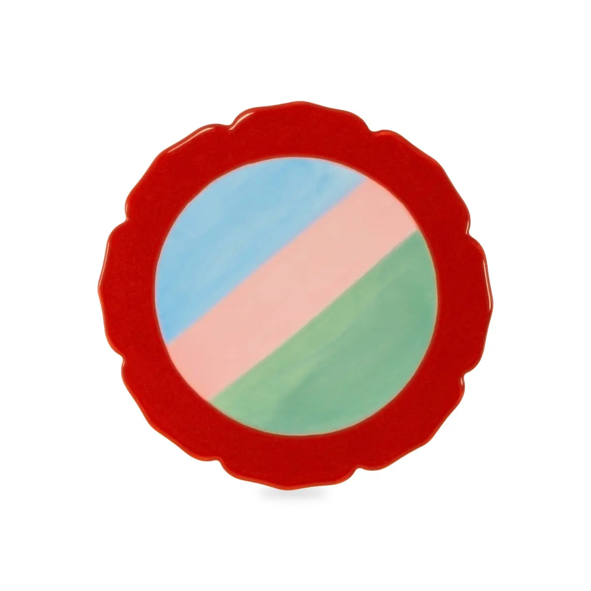 Sottopentola a forma irregolare con bordo rosso e al centro fantasia a strisce azzurro rosa e verde. Sfondo bianco