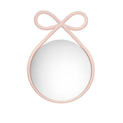 Specchio da parete arricchito da un bordo a forma di fiocco rosa Qeeboo