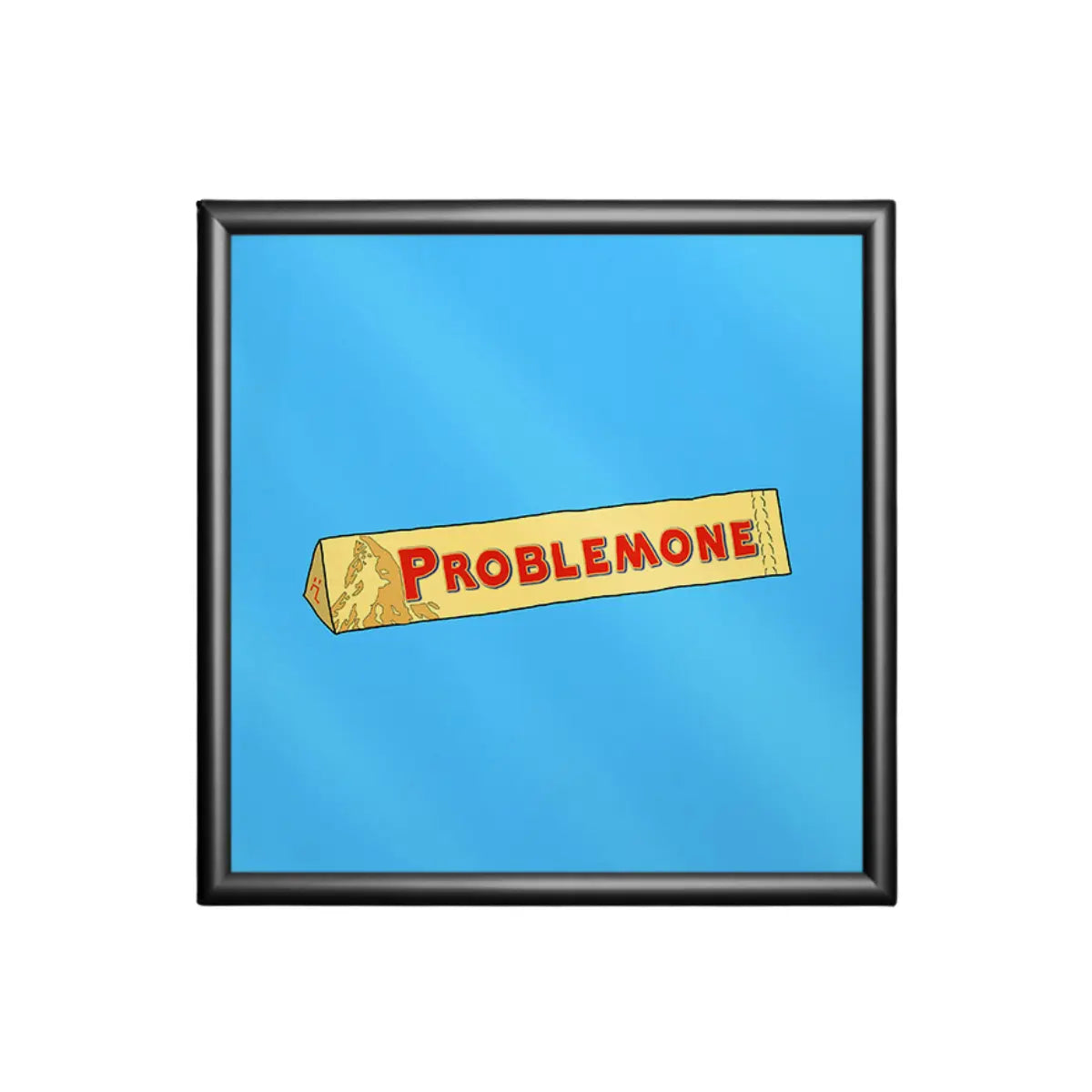 Stampa su sfondo azzurro con una confezione di torrone e la scritta ironica problemone con cornice nera