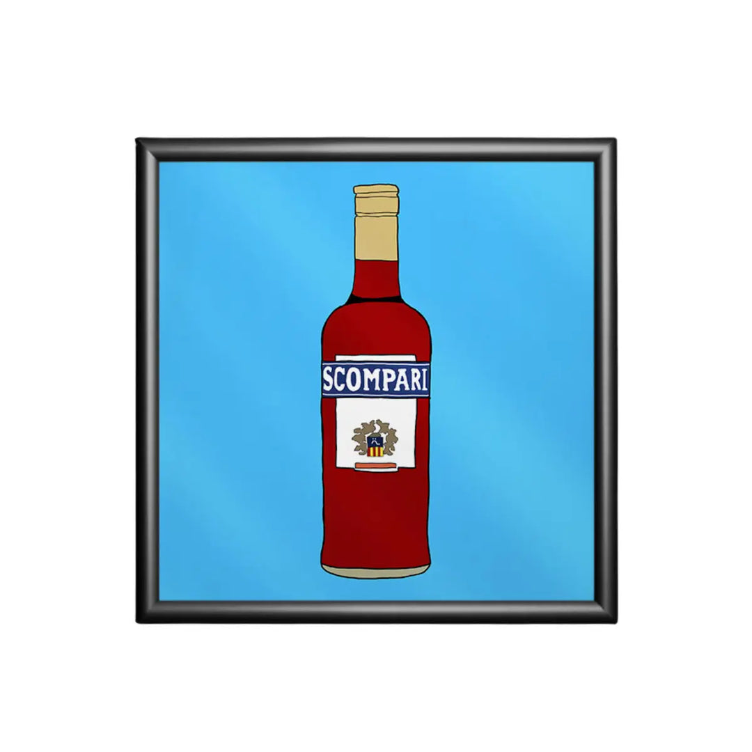 Stampa su sfondo azzurro con una bottiglia di Campari e la scritta ironica scompari con cornice nera