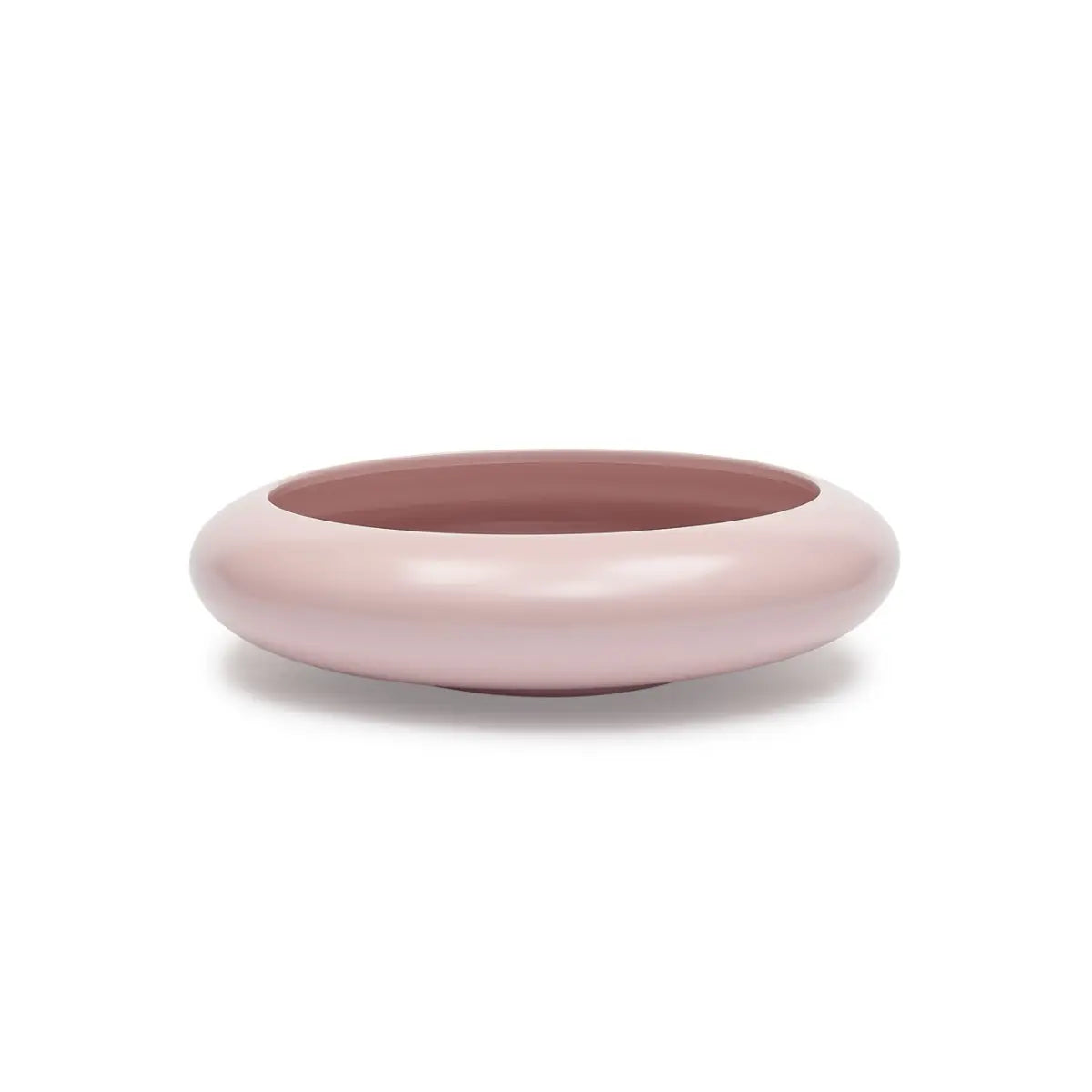 Vista alaterale della lampada da tavolo/ svuotatsche rotonda rossa chiaro. Sfondo bianco