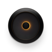 Lampada da tavolo/ svuotatsche rotonda nero con luce accesa al centro. Sfondo bianco