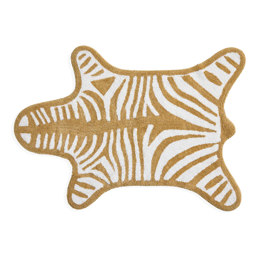 Tappeto da bagno zebrato bianco e cammello. Forma pelle zebra. Immagine su sfondo bianco