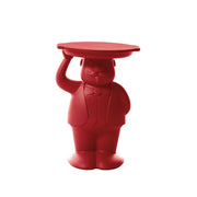 Tavolino rosso che rappresenta un maggiordomo con un braccio alzato che sostiene un vassoio che funge da appoggio del tavolino. Sfondo bianco