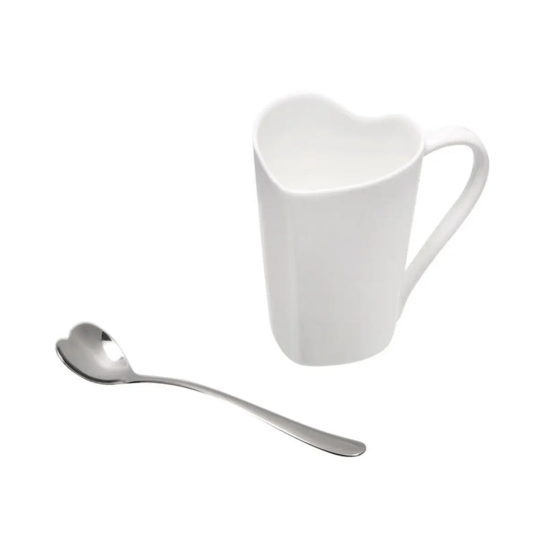 Set da tè con tazzina in ceramica bianca a forma di cuore e cucchiaio in acciaio coordinato