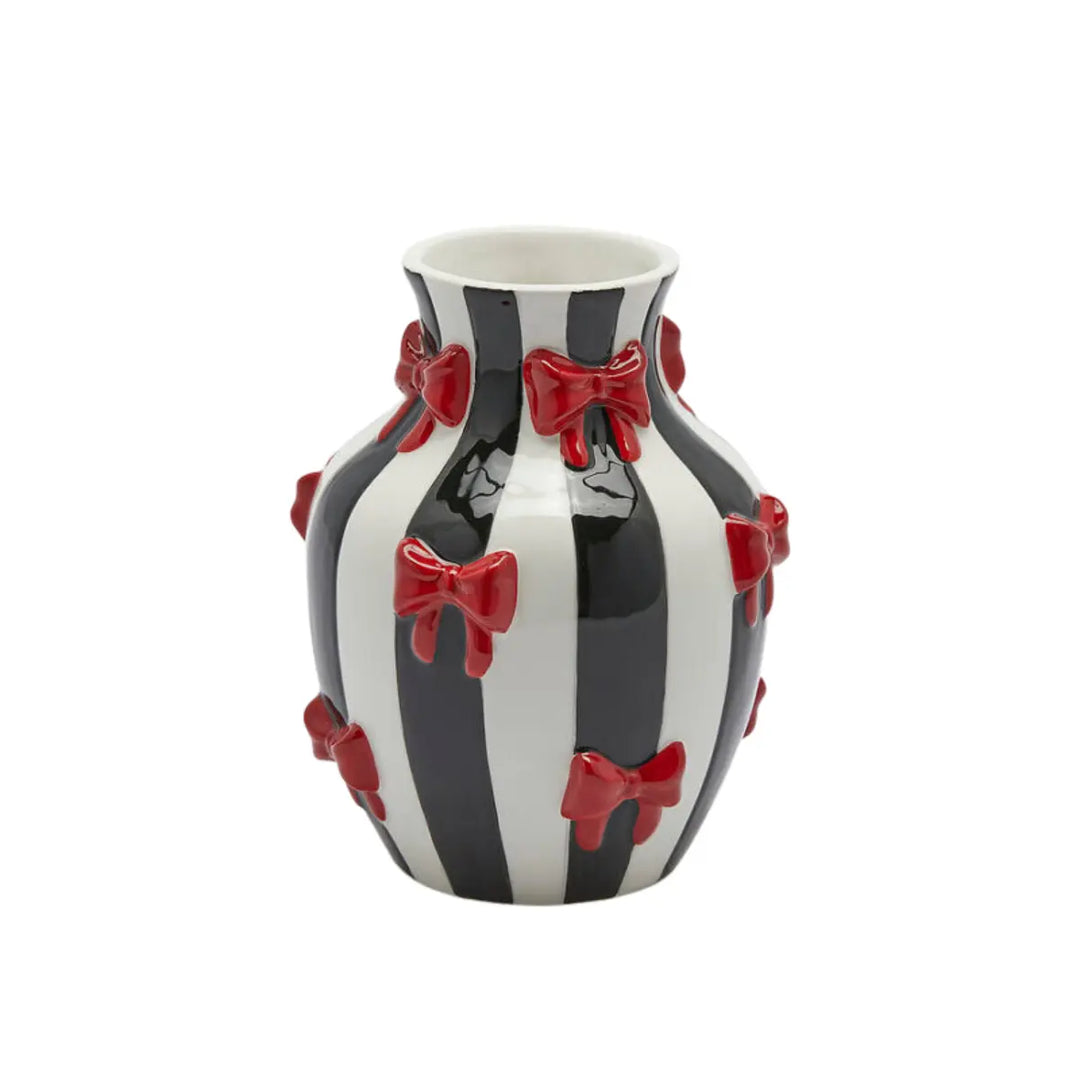 Vaso a righe bianche e nero con fiocchi rossi per fiori 