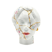 Vaso Kintsugi Head di Seletti in porcellana con dettagli dorati – Design Marcantonio