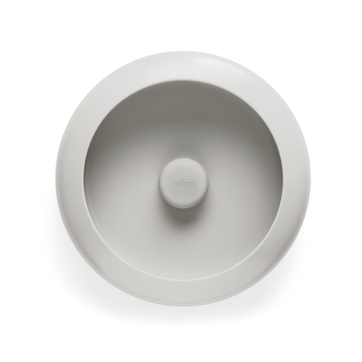 Lampada da tavolo/ svuotatsche rotonda beige con luce al centro. Sfondo bianco