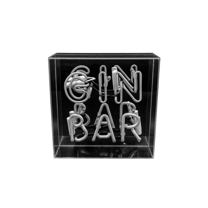 insegna neon non illuminata con scritta gin bar su retro nero e sfondo bianco.
